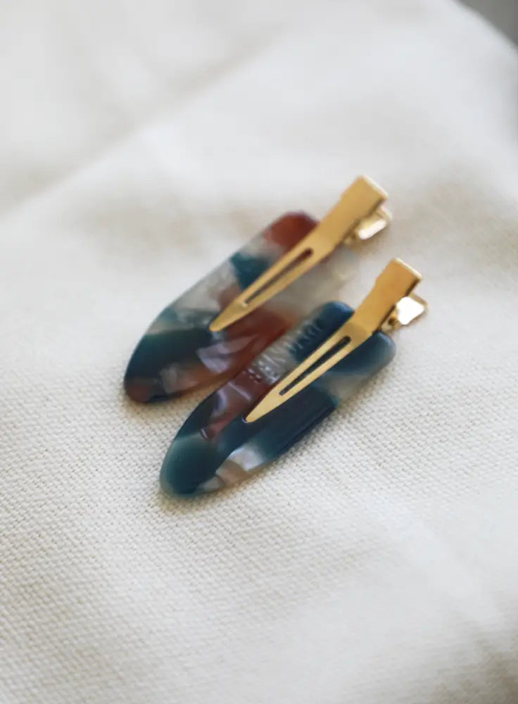 Barrettes maquillage Élysée bleu rouge ivoire en acétate – élégantes et résistantes à l’eau